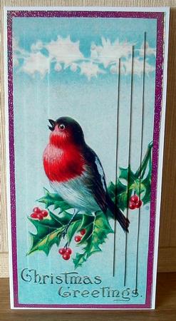A Lovely Red Robin on Holly Pyramids by Cheryl French