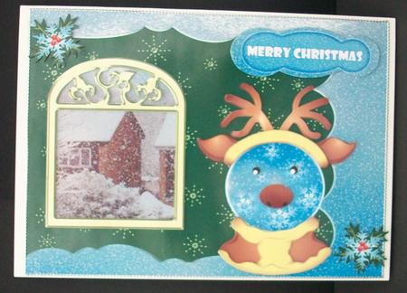 Snowy Christmas with a Reindeer Snowglobe by Cheryl French