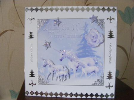 Unicorns in the Snow with White Rose by Cheryl Smith