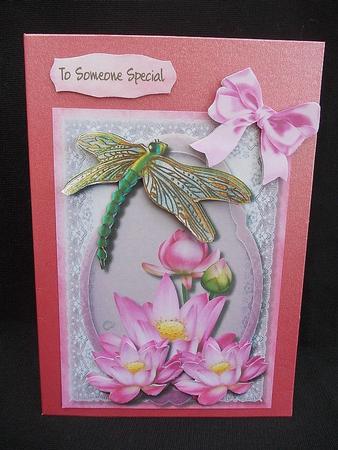 Beautiful Dragonfly and Lotus Flowers  by Chris Stow