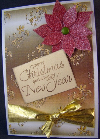 Embossed Holly Flourishes in Gold by Chris Williams