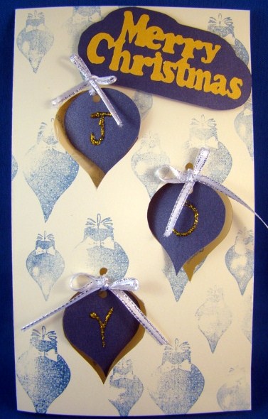 Hanging Shaped Bauble Aperture Christmas Card by Chris Williams