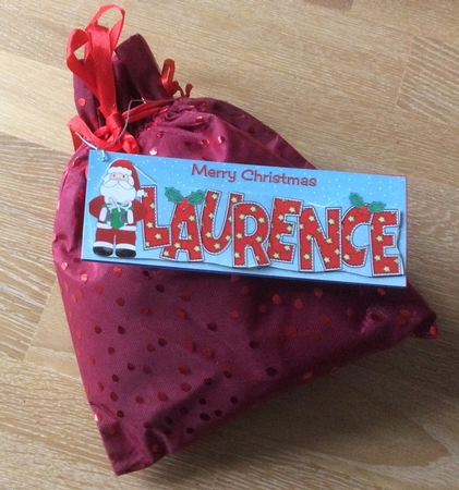 Santa with Present Laurence Large Dl by Christiane Lions
