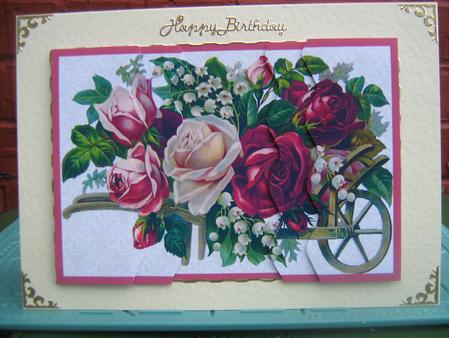Wheelbarrow of Flowers by Christine  Duncan
