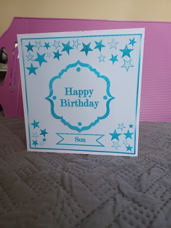 7.5 in blue stars quick card front. by Christine Garner