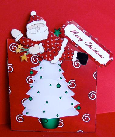 Santa on Top of the Tree Over the Edge by Christine Pagan