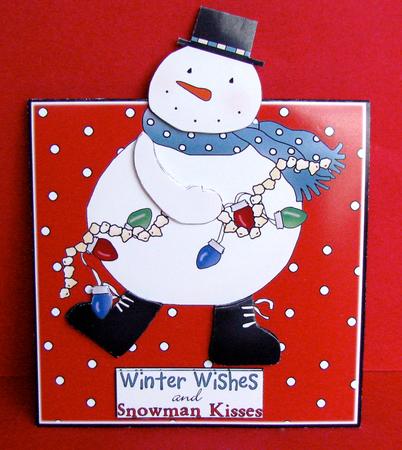 Snowman with Fairy Lights Over the Edge by Christine Pagan