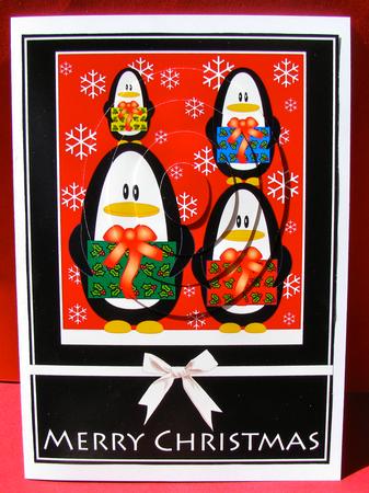 Christmas Penguins Pyramid (black) by Christine Pagan