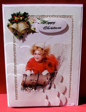 Christmas Girl on Sledge by Christine Pagan