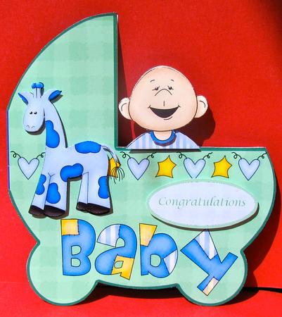 Green Baby Boy Shaped Pram by Christine Pagan