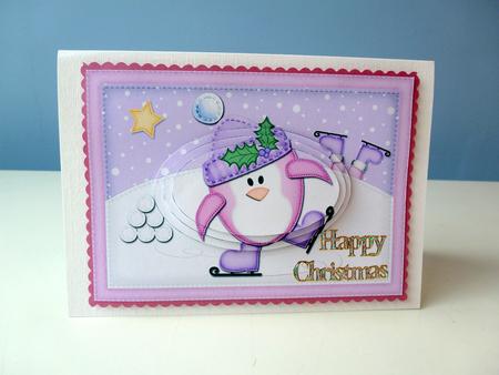 A5 Xmas Skating Penguin Oval Pyramage Topper by Christine Simmonds