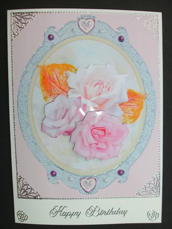 Pink Roses in Oval Frame by Christine Sutton