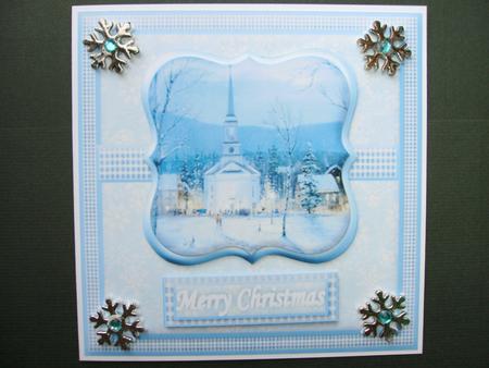 Church in the Snow Christmas Card Front Blue by Christine Sutton