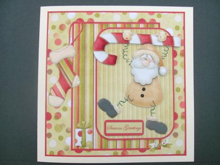 Santa with His Candy Cane by Christine Sutton
