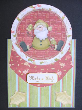 Hohoho Sant Has Spring Arms and Legs Over the Edge by Christine Sutton