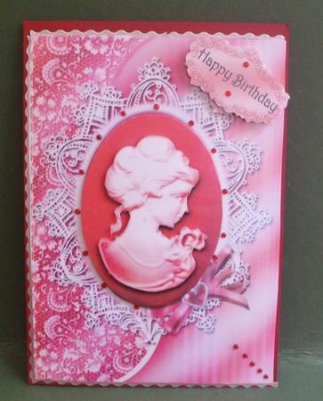 Beautiful Red Cameo in Fancy Silver Frame by Christine Young