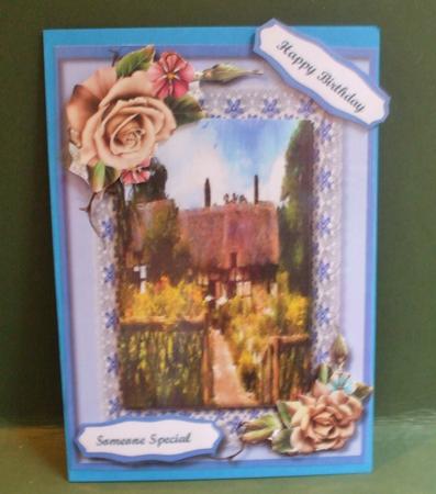 Rose Cottage and Champagne Roses  by Christine Young