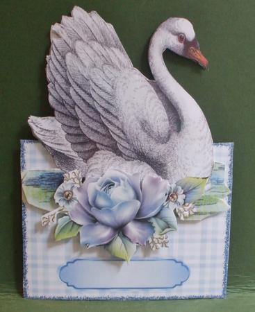 Beautiful White Swan with Blue Roses Over the Edge Crd by Christine Young
