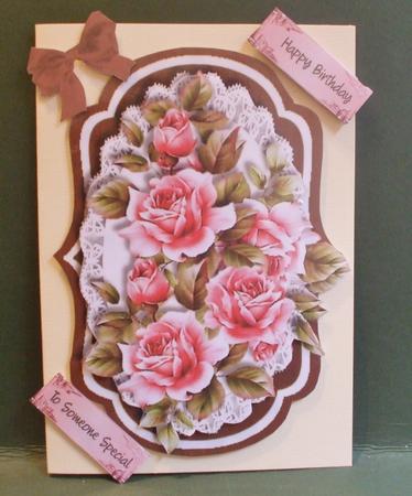 Beautiful Pink Roses in a Deep Taurpe Bracket by Christine Young