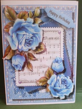 Stunning Blue Roses on a Music Sheet 3  by Christine Young