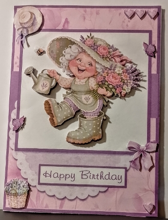 Grandma with flowers and giant boots by COLETTE MORRIS