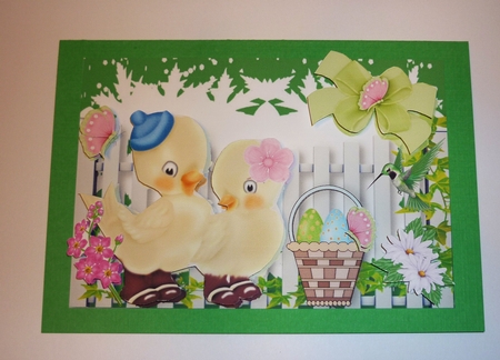 Couple of Love Birds with Easter Eggs in a Basket by Cornelia Orgahs