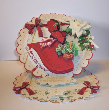 Arranging the Christmas Flowers Scalloped Round Easel Card by Cornelia Orgahs