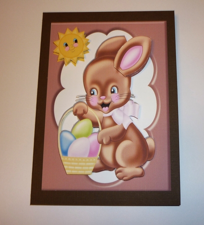 Chocolate Bunny with Easter Eggs in Chocolate Frame by Cornelia Orgahs