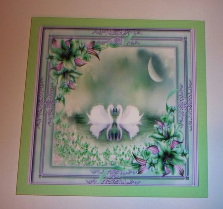 Beautiful Swans in a Lilac and Green Frame  by Cornelia Orgahs