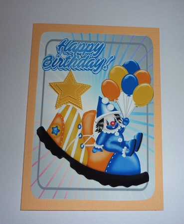 Jolly little clown in blue sat on clowns shoe with balloons A5 by Cornelia Orgahs