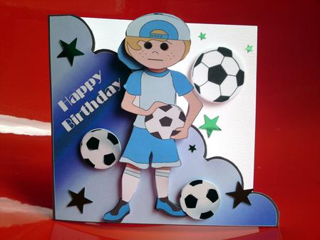 Boy with Football Cut and Fold by Cynthia Massey