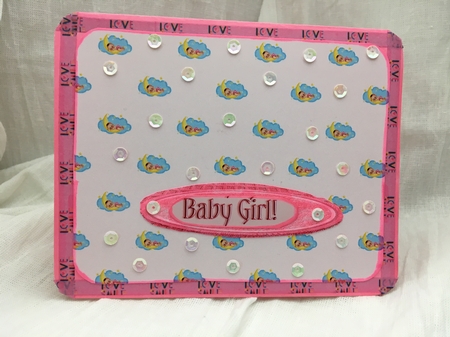 A4 pink backing paper with a baby girl on a cloud. by Darlene Handorff