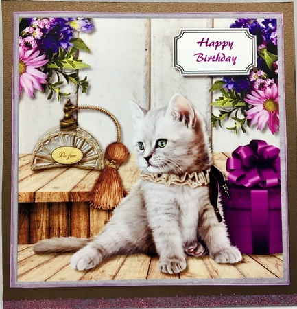 Kitten, perfume, gift and flowers by Darlene Handorff