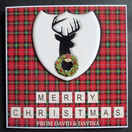 Merry Christmas card in red and green tartan, stag emblem, wreath and scrabble letters topper for 6x6 card by Davina Rundle