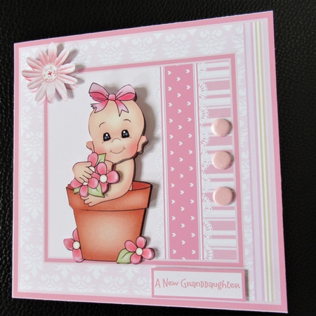 Baby girl in a flower pot 7x7 card by Davina Rundle