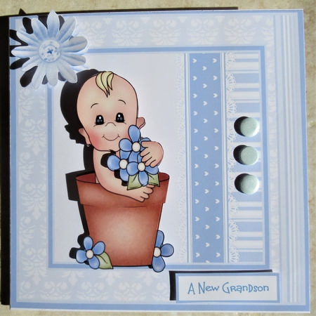 Baby boy in a flower pot 7x7 card by Davina Rundle