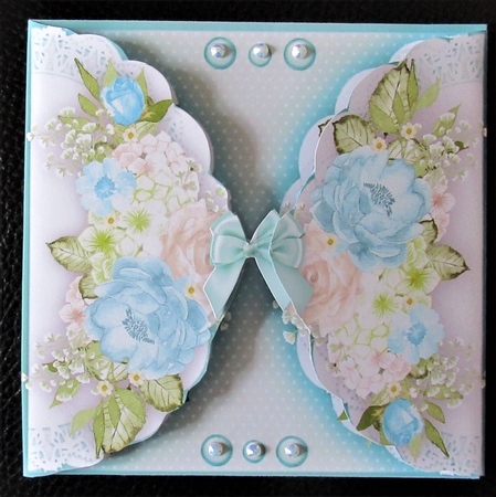 Aqua Roses on Lace  by Davina Rundle