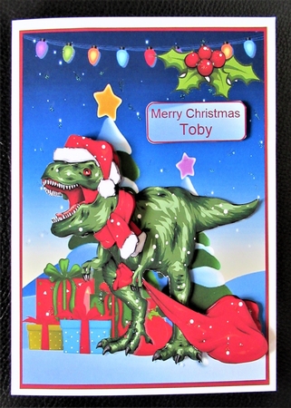 Dinosaur drops off Christmas presents A5 by Davina Rundle