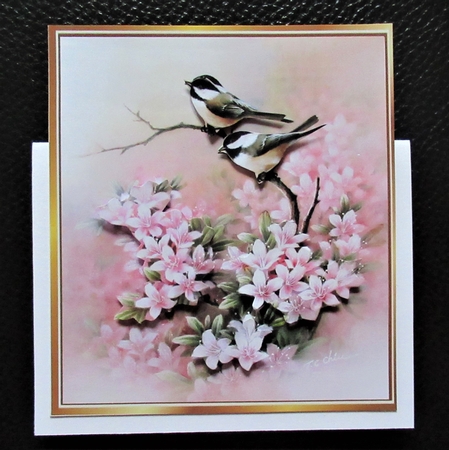 Pretty birds on a branch with pink flowers toppers  by Davina Rundle