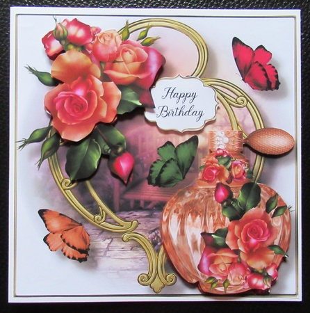 Perfume Bottle On Golden Frame - Peach Melba Blooms by Davina Rundle