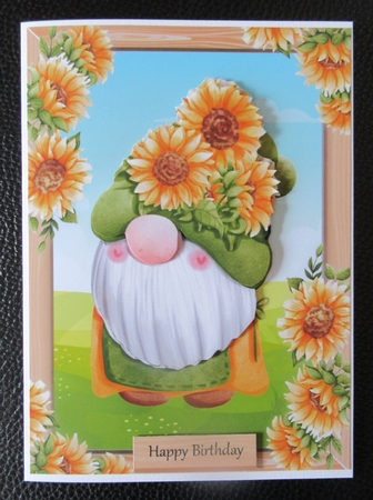 Gonk With A Green Sunflower Hat A5 by Davina Rundle