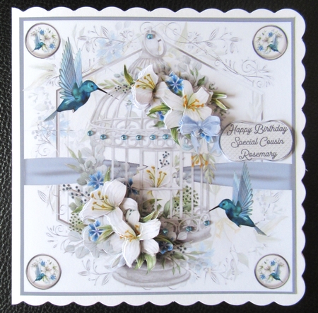 Bird cage and flowers by Davina Rundle