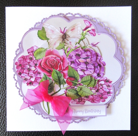 Mixed flowers and butterfly scallop card by Davina Rundle