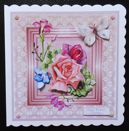 Mixed flowers and butterfly 7x7 by Davina Rundle