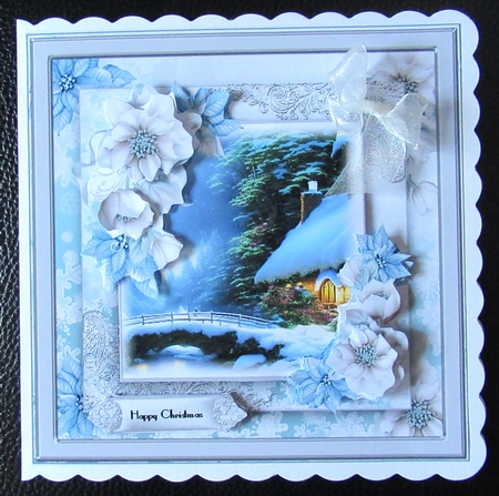 Snow covered cottage by the river by Davina Rundle