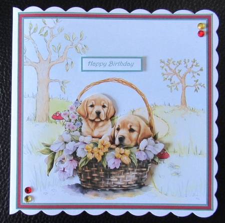 Puppies in a basket of flowers 7x7 by Davina Rundle