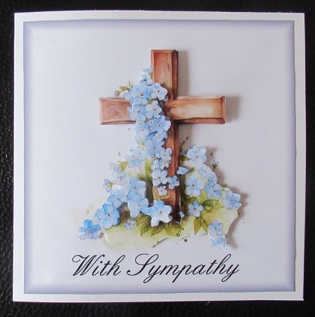 Sympathy Forget-me-nots on a wooden cross by Davina Rundle