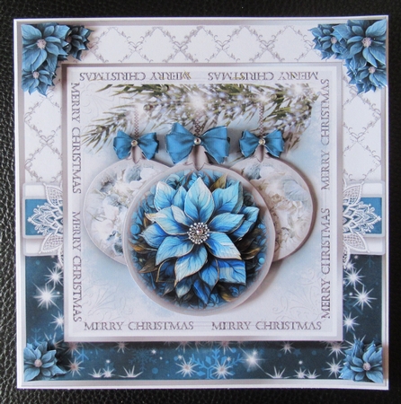 Blue Poinsettia bauble by Davina Rundle