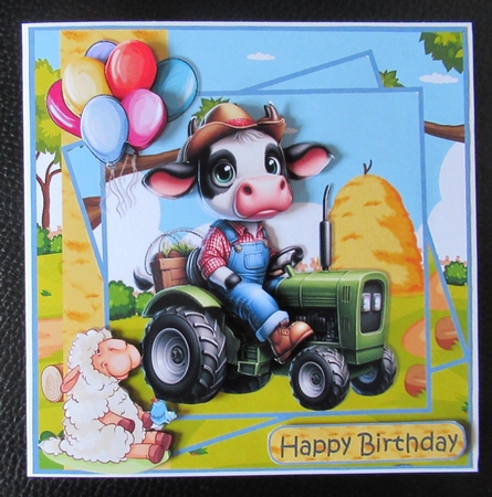 Cow drives a tractor by Davina Rundle