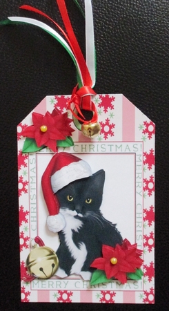 Little Black Kitty in Santa Hat on a Tag by Davina Rundle